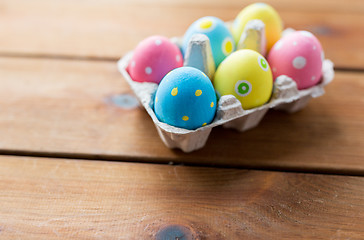 Image showing close up of colored easter eggs in egg box