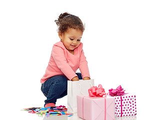 Image showing happy little baby girl with birthday presents