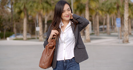 Image showing Thoughtful attractive young woman