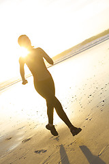 Image showing Running at the beach