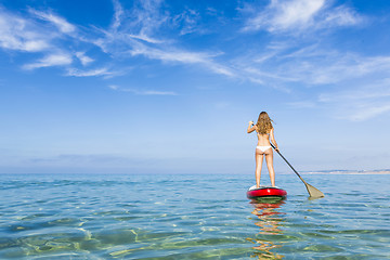 Image showing Woman practicing paddle