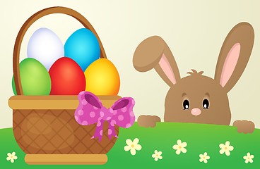 Image showing Lurking Easter bunny and egg basket