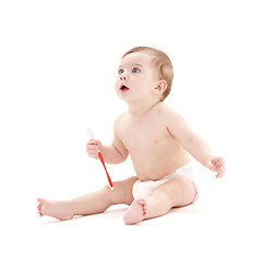 Image showing baby boy in diaper with toothbrush #2