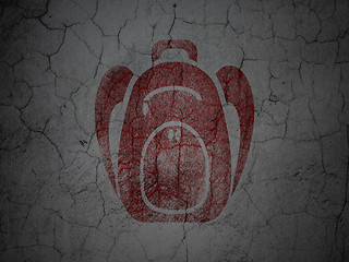 Image showing Travel concept: Backpack on grunge wall background