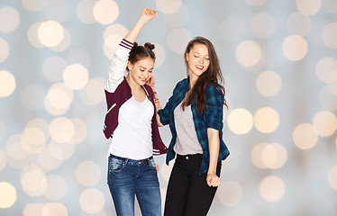 Image showing happy smiling pretty teenage girls dancing