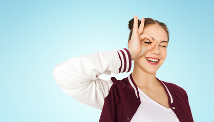 Image showing happy teenage girl making face and having fun