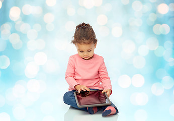 Image showing little baby girl playing with tablet pc computer