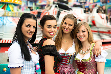 Image showing Gorgeous young women at German funfair