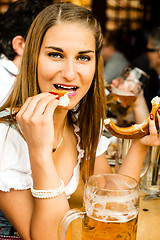 Image showing Girl drinking beer at Oktoberfest