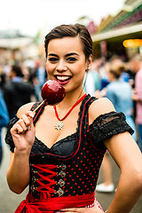 Image showing Attractive young woman with love apple at the Oktoberfest