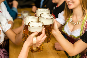 Image showing Bavarian girls drinking beer