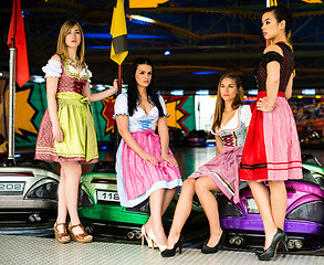 Image showing Gorgeous young women at German funfair