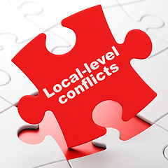 Image showing Politics concept: Local-level Conflicts on puzzle background