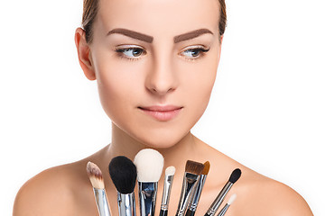 Image showing Beautiful female eyes with make-up and brushes