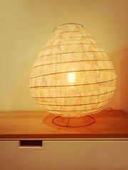 Image showing Cozy lamp giving warm yellow light