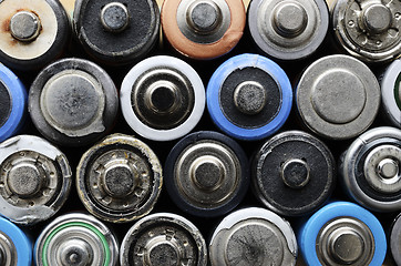 Image showing lot of old used batteries