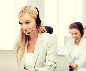 Image showing friendly female helpline operator