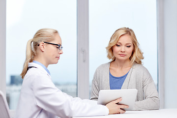 Image showing doctor with tablet pc and ill woman at hospital