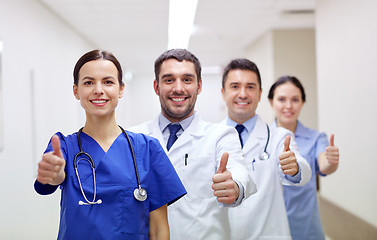 Image showing medics or doctors at hospital showing thumbs up