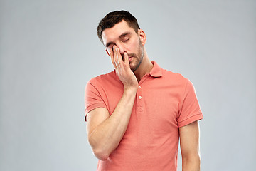 Image showing young man suffering from headache