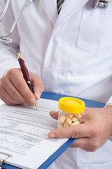 Image showing Doctor with medical health record