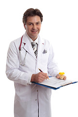 Image showing Doctor with health record and medicine