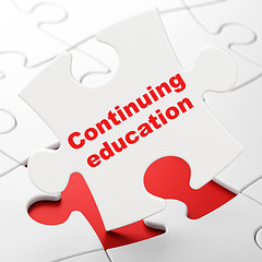 Image showing Learning concept: Continuing Education on puzzle background