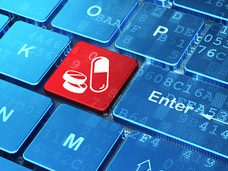 Image showing Medicine concept: Pills on computer keyboard background