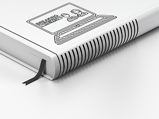 Image showing News concept: closed book, Breaking News On Laptop on white background