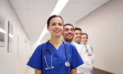 Image showing group of happy medics or doctors at hospital