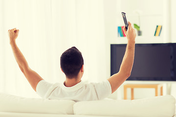 Image showing man watching tv and supporting team at home