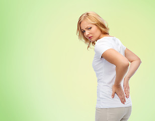 Image showing unhappy woman suffering from backache