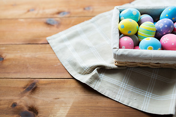 Image showing close up of colored easter eggs in basket