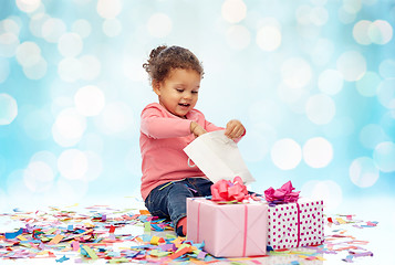 Image showing happy little baby girl with birthday presents