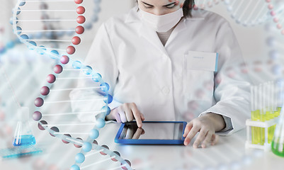 Image showing close up of scientist with tablet pc in laboratory