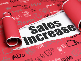 Image showing Marketing concept: black text Sales Increase under the piece of  torn paper