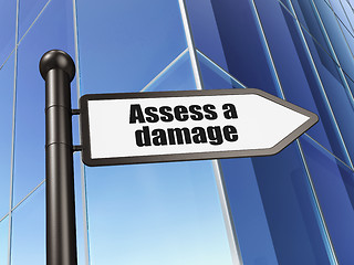 Image showing Insurance concept: sign Assess A Damage on Building background