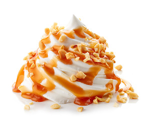Image showing whipped cream with caramel sauce on white background