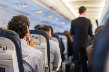 Image showing Passengers on the airplane.