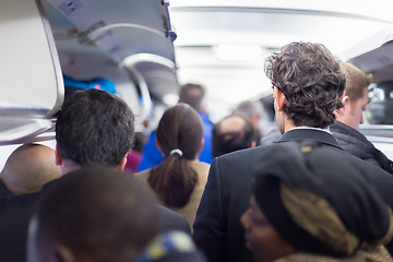 Image showing Peoplle disebarking the airplane.