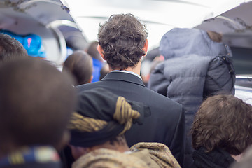 Image showing Peoplle disebarking the airplane.