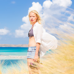 Image showing Free Happy Woman Enjoying Sun on Vacations.