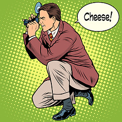 Image showing Photographer photographing cheese smile