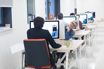 Image showing startup business, woman  working on desktop computer