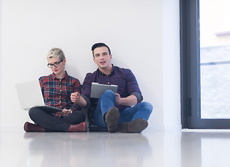 Image showing startup business, couple working on laptop computer at office