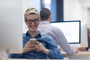 Image showing startup business, woman  working on desktop computer