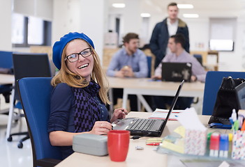 Image showing startup business, woman  working on laptop