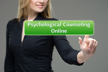 Image showing Businesswoman presses button psychological counseling online on virtual screens. technology, internet and networking concept.