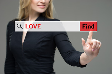 Image showing Find Love word woman touching on red tab virtual screen for business concept