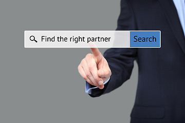 Image showing man presses button - find the right partner.